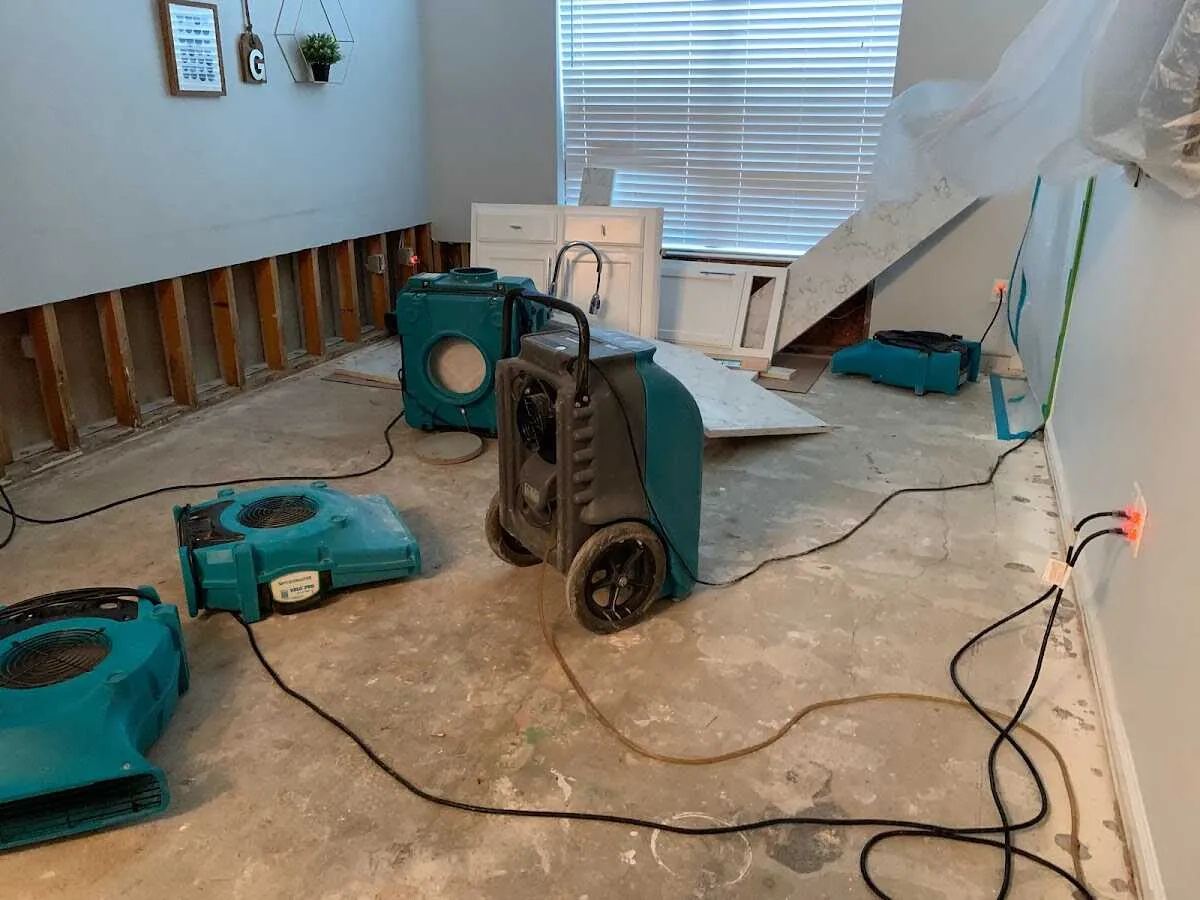 Dehumidifier in flood-cut room for Water Damage Restoration in Delray Beach